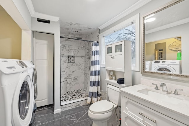 bathroom featuring a shower with curtain, vanity, crown molding, separate washer and dryer, and toilet