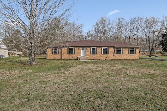 ranch-style house featuring a front yard