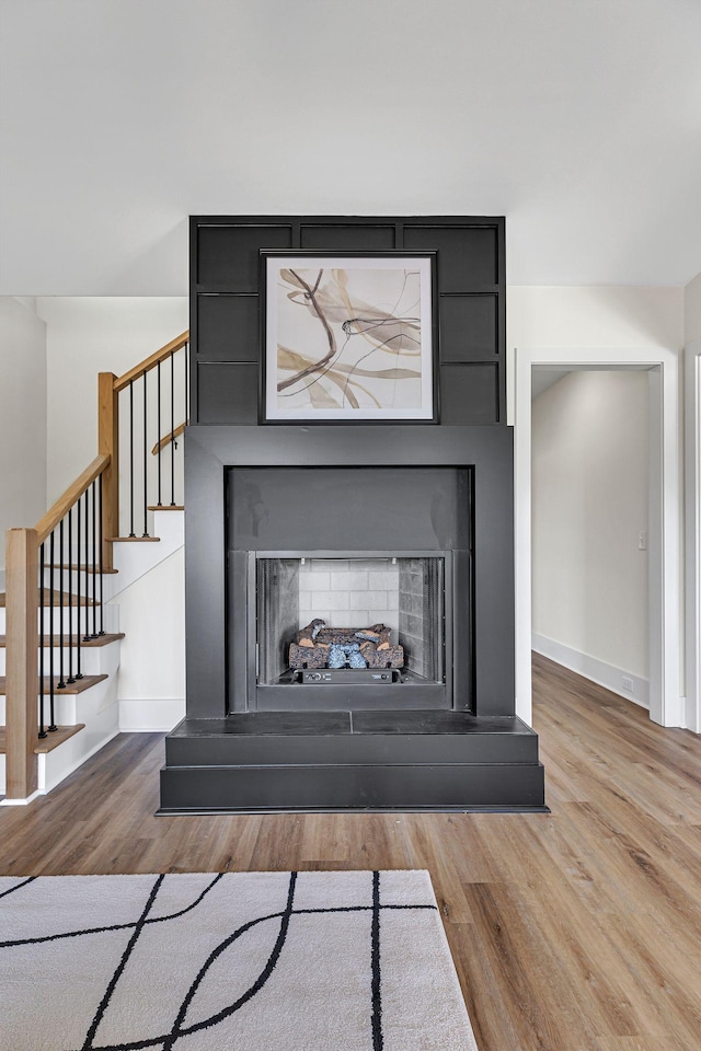 interior details with hardwood / wood-style flooring