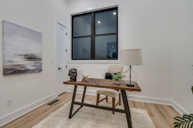 office area featuring light hardwood / wood-style flooring