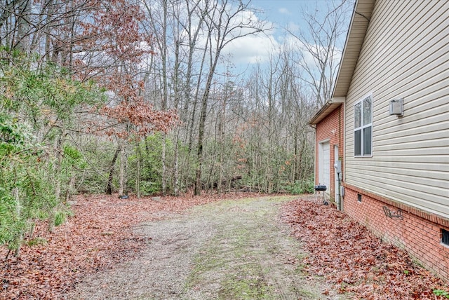 view of yard with a garage