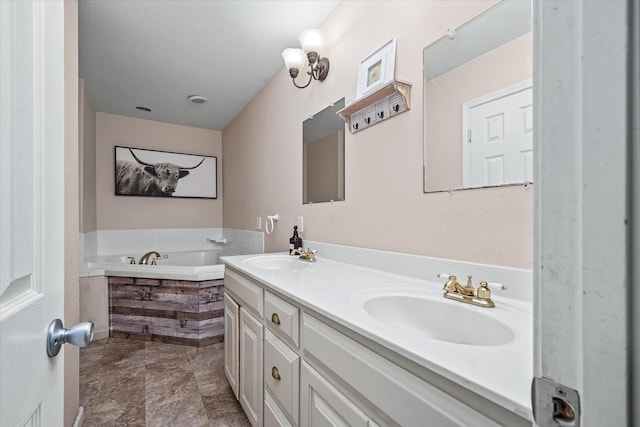 bathroom featuring a bathing tub and vanity