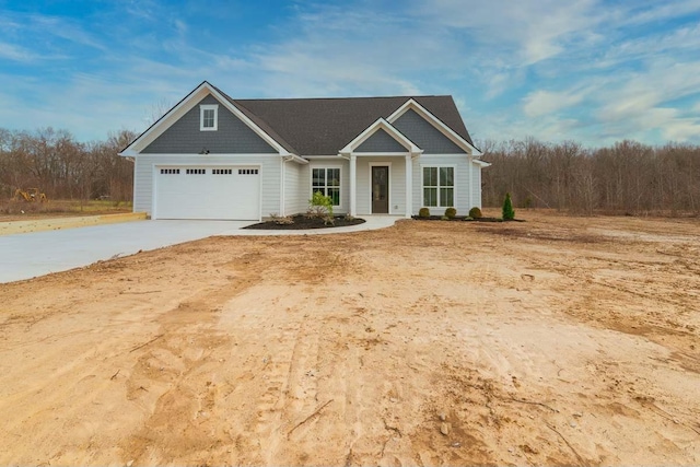 craftsman inspired home with a garage