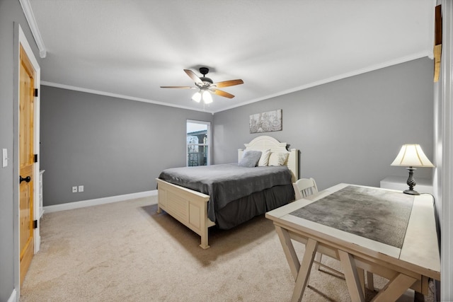 carpeted bedroom featuring ceiling fan and ornamental molding