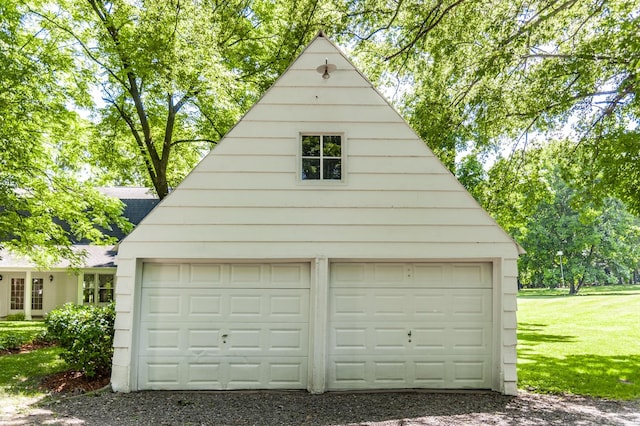 garage with a yard