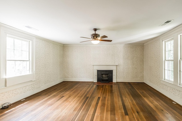 unfurnished living room featuring crown molding, ceiling fan, and hardwood / wood-style flooring