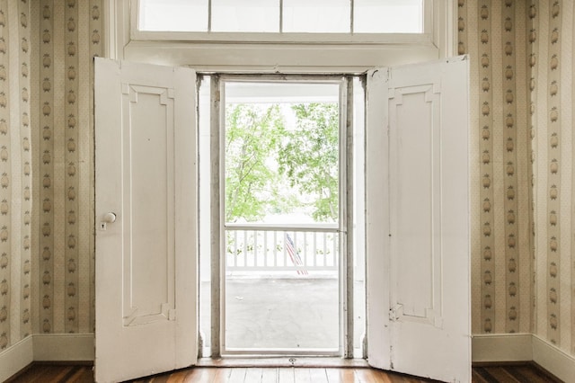 doorway to outside with hardwood / wood-style flooring