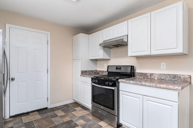 kitchen featuring white cabinets and appliances with stainless steel finishes