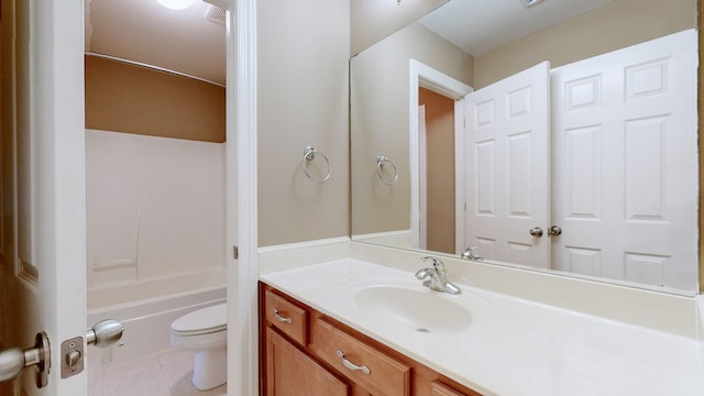 full bath featuring toilet, bathing tub / shower combination, vanity, and tile patterned floors