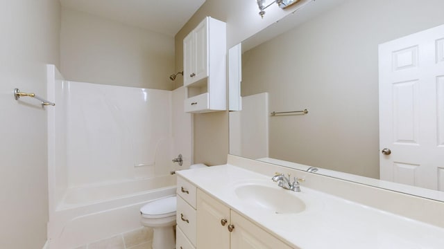 full bath with tile patterned flooring, bathing tub / shower combination, vanity, and toilet