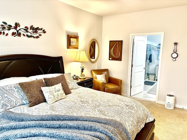 carpeted bedroom featuring a walk in closet and a closet