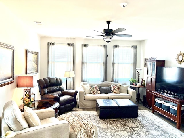 living room featuring ceiling fan