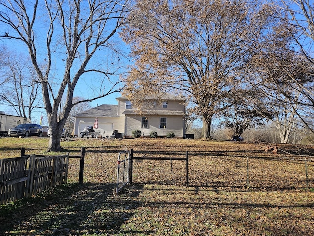 view of yard featuring a garage