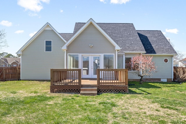 back of house with a yard, a deck, and french doors