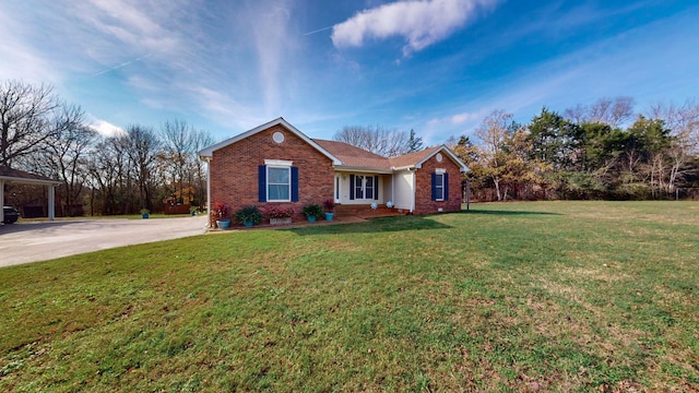 ranch-style home with a front yard