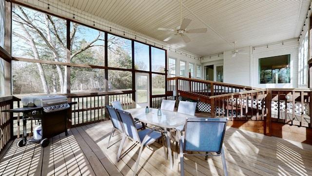 sunroom / solarium with ceiling fan