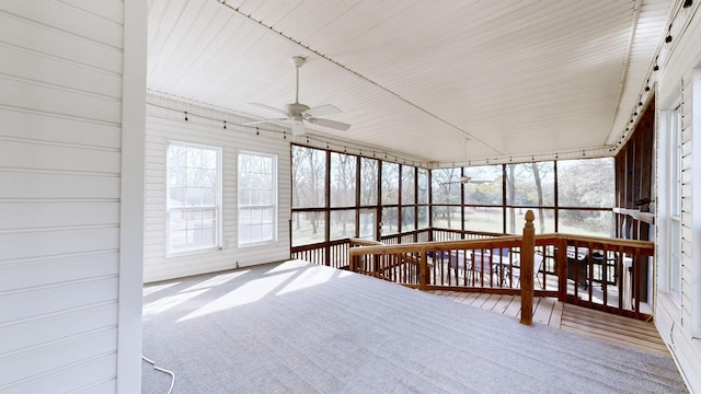 sunroom / solarium with ceiling fan