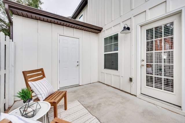 doorway to property with a patio area