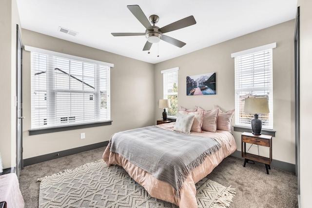 carpeted bedroom featuring ceiling fan