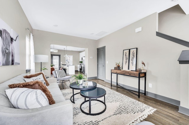 living room with dark wood-type flooring