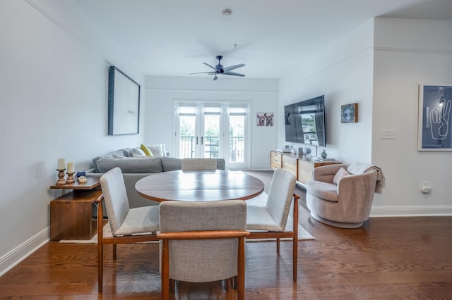 dining room featuring dark hardwood / wood-style flooring and ceiling fan