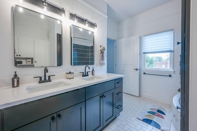 bathroom featuring tile patterned floors and vanity