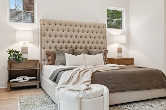 bedroom with wood finished floors