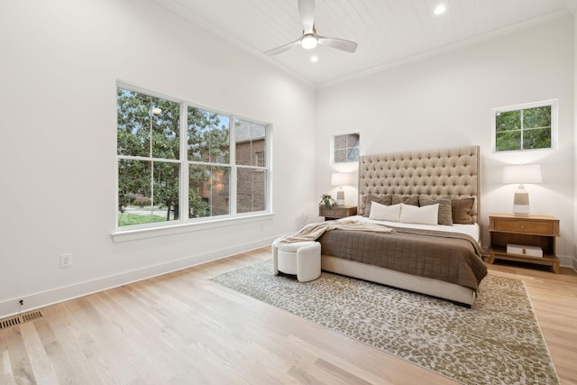 bedroom featuring visible vents, baseboards, recessed lighting, wood finished floors, and a ceiling fan