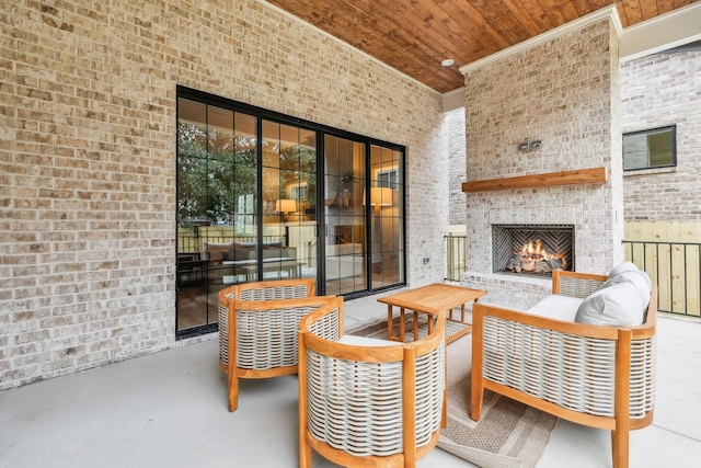 view of patio / terrace featuring an outdoor living space with a fireplace