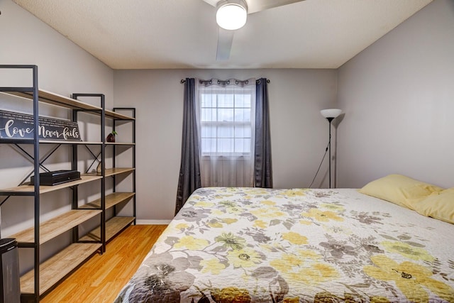 bedroom featuring wood finished floors