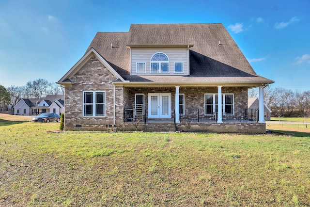 view of front of home featuring a front lawn and covered porch