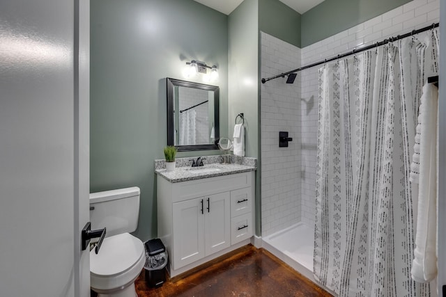 bathroom with vanity, curtained shower, and toilet