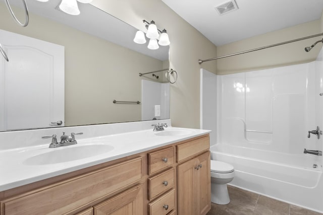 full bathroom with shower / bathing tub combination, vanity, and toilet