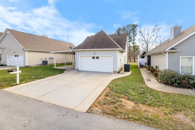 exterior space featuring a carport, cooling unit, a garage, and a yard