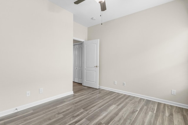 unfurnished bedroom featuring ceiling fan and light hardwood / wood-style floors