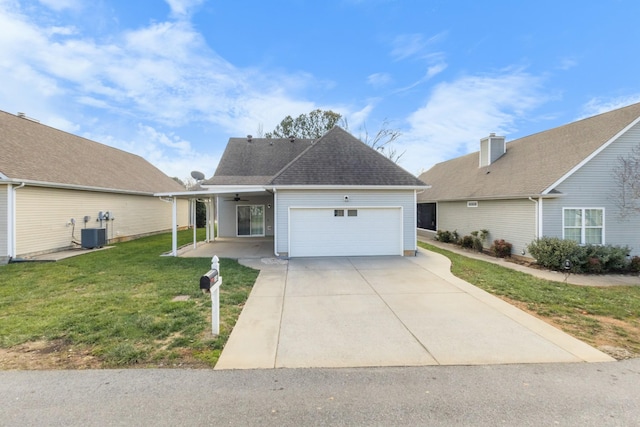 view of front of home with a front yard, central AC, ceiling fan, and a garage