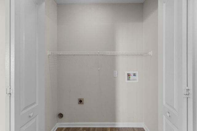 laundry room with hookup for an electric dryer, hardwood / wood-style floors, and hookup for a washing machine