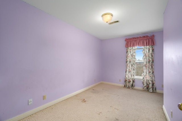 view of carpeted spare room