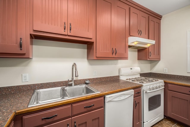 kitchen featuring white appliances and sink