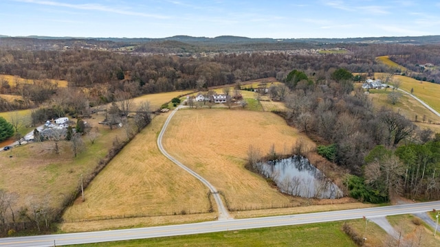 drone / aerial view with a rural view and a water view