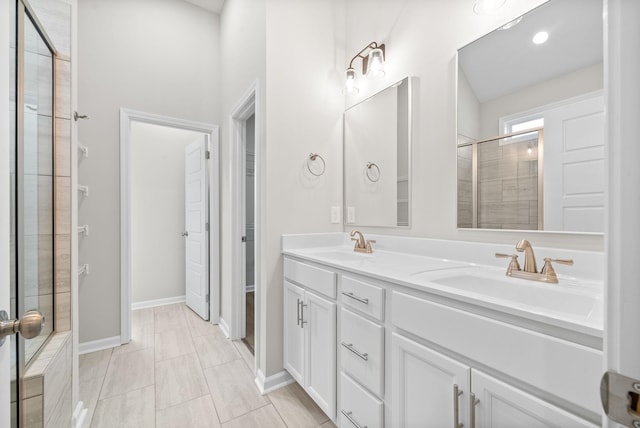 bathroom with vanity and walk in shower