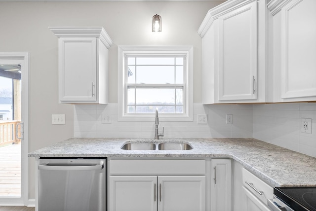 kitchen featuring stainless steel dishwasher, white cabinetry, and sink