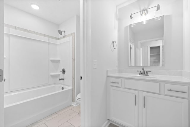 full bathroom with bathing tub / shower combination, vanity, and toilet