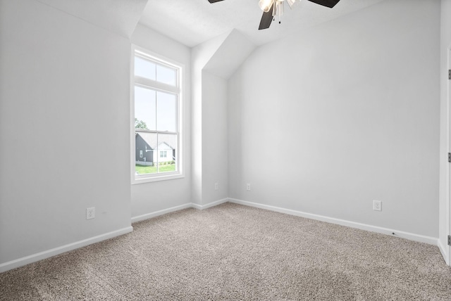 bonus room with carpet flooring and ceiling fan