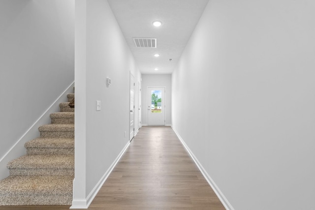 corridor featuring light wood-type flooring