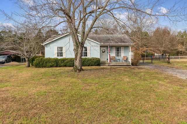 ranch-style house with a front lawn