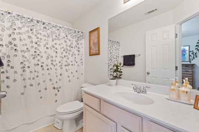 full bathroom featuring vanity, toilet, and shower / tub combo