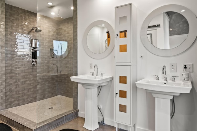 bathroom with tiled shower