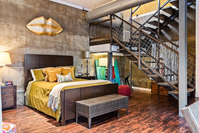 bedroom with wood-type flooring