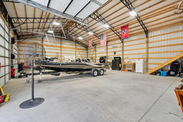 garage with white refrigerator